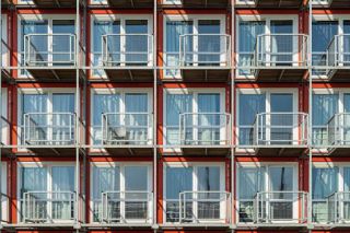 A shipping container housing complex