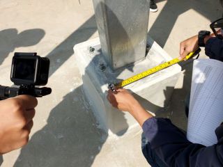 Installing container roofs.jpg
