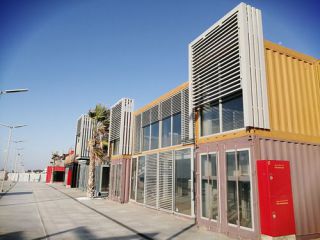 Exterior frames for accommodating windows and facades on a commercial shipping container project.jpg